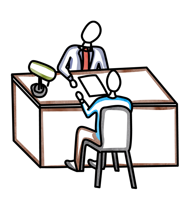 Two people meeting at a desk.