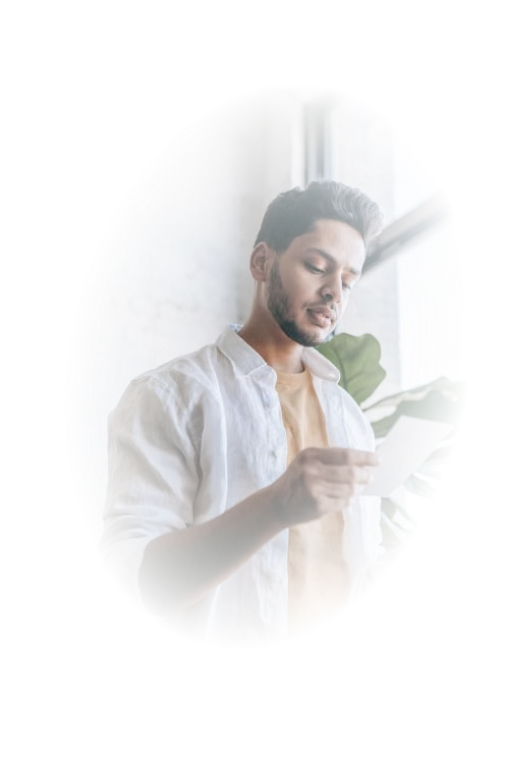 A man looking at a document